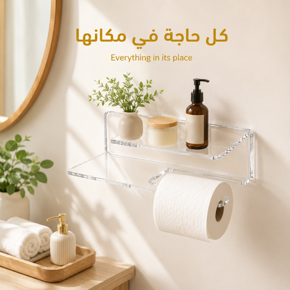 Bathroom shelf with toiletries and plants on a light beige wall.